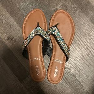 Sandals size 11 fit like ten, sparkle straps memory foam